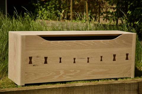 Whitewashed white-oak storage chest with charred handle