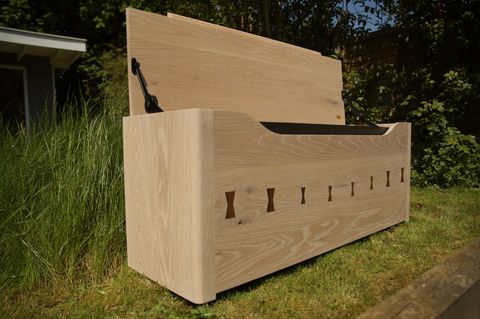 Whitewashed white-oak storage chest with charred handle